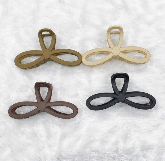 Matte Infinity Hair Claw Clip – Minimal Bow Design (Neutral Shades)